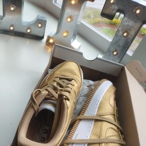 Gold Nikes